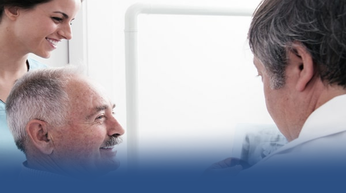 Doctors helping a patient